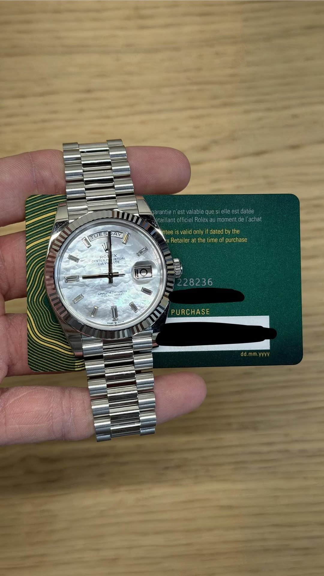 May be an image of wrist watch and text
