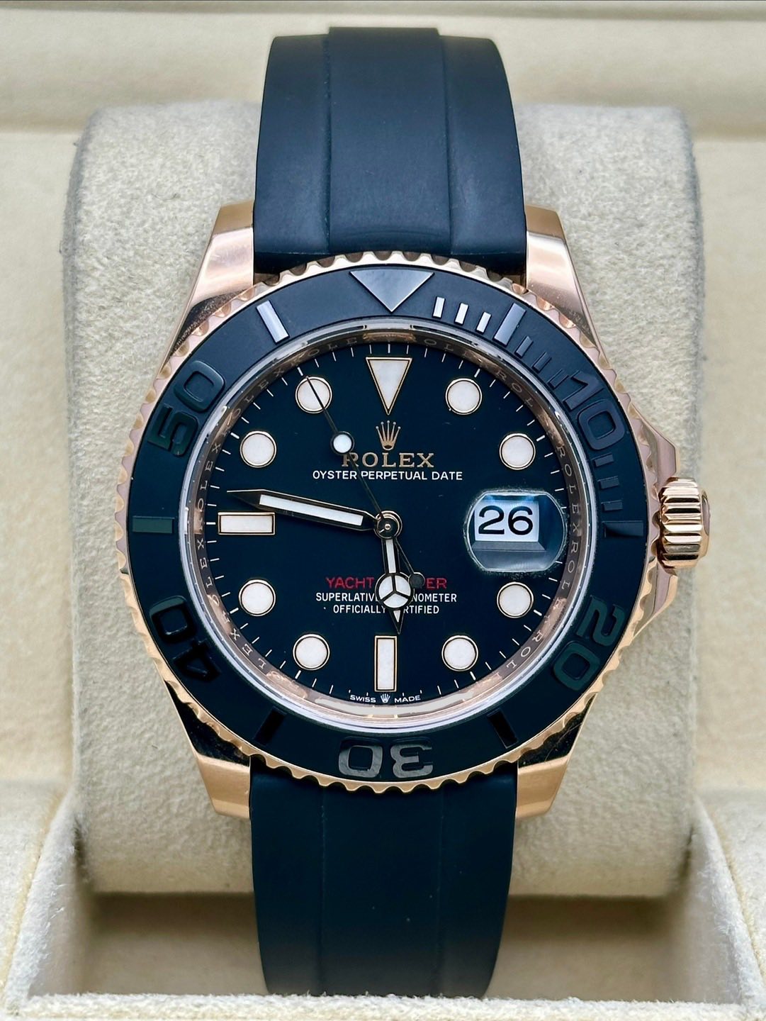 May be an image of wrist watch and text that says 'OYSTER ROLEX ROLEX PERPETUAL OYSTERPERPETUALDATE DATE 26 SUPERLATIV OFFICIALL OMETER RTIFIED 1 R 2 0 L SWISS MADE'