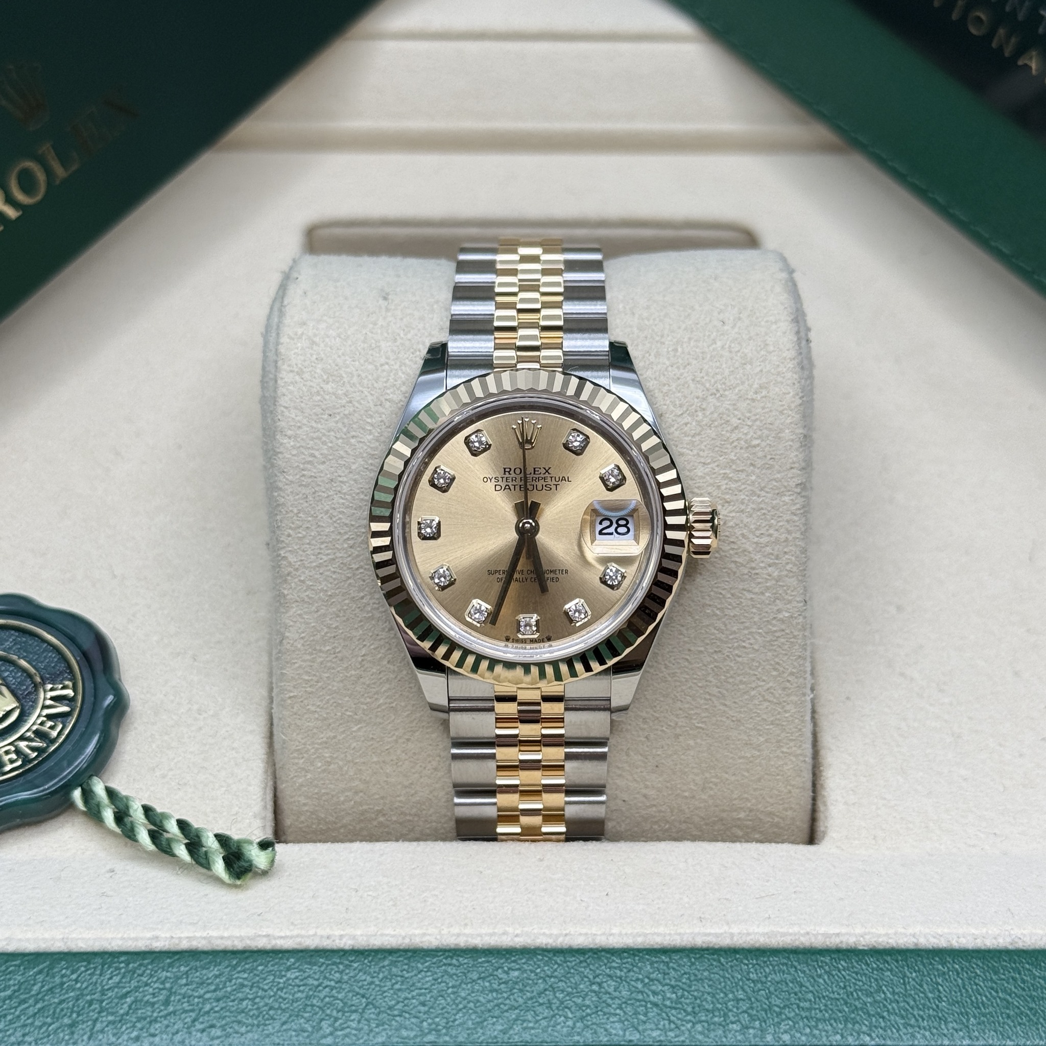 May be an image of wrist watch and text