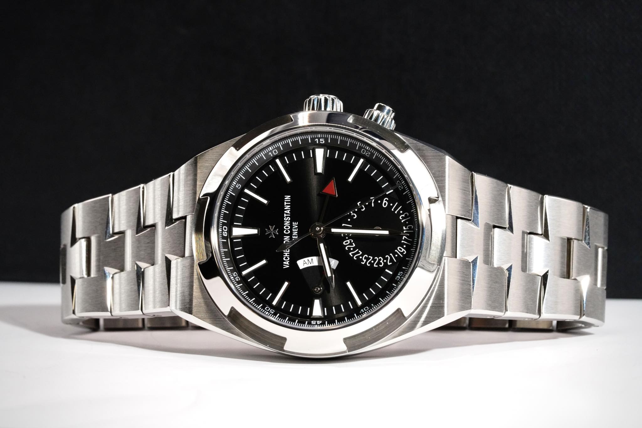 May be an image of wrist watch and text