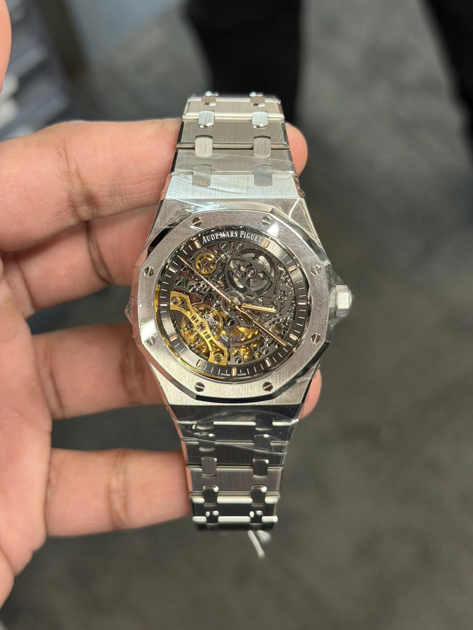 May be an image of wrist watch and text