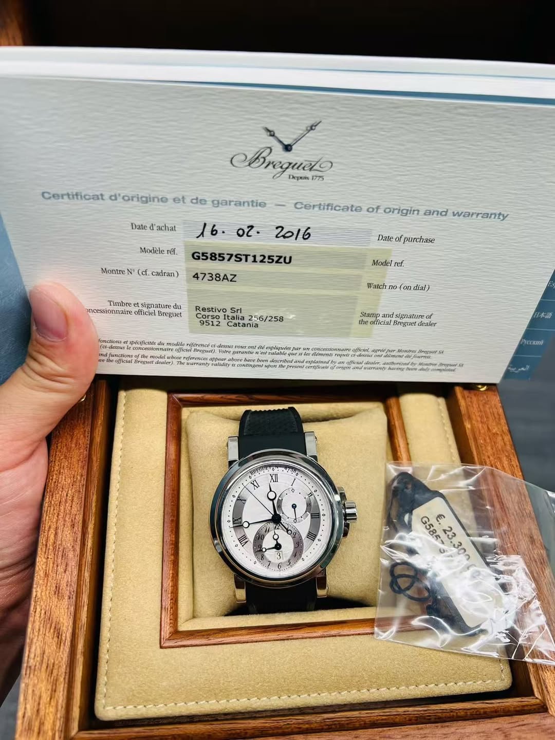May be an image of wrist watch and text