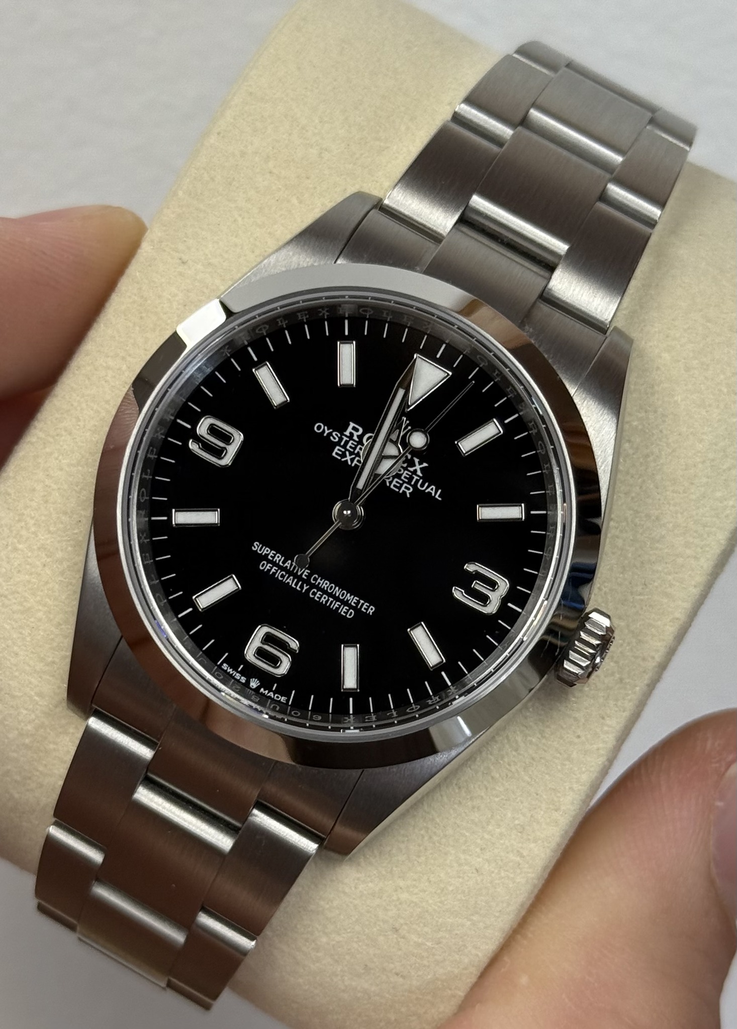 May be an image of wrist watch and text