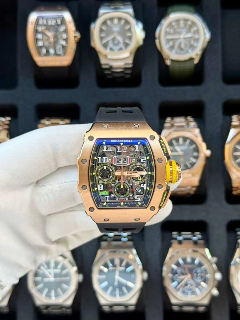 May be an image of wrist watch and text