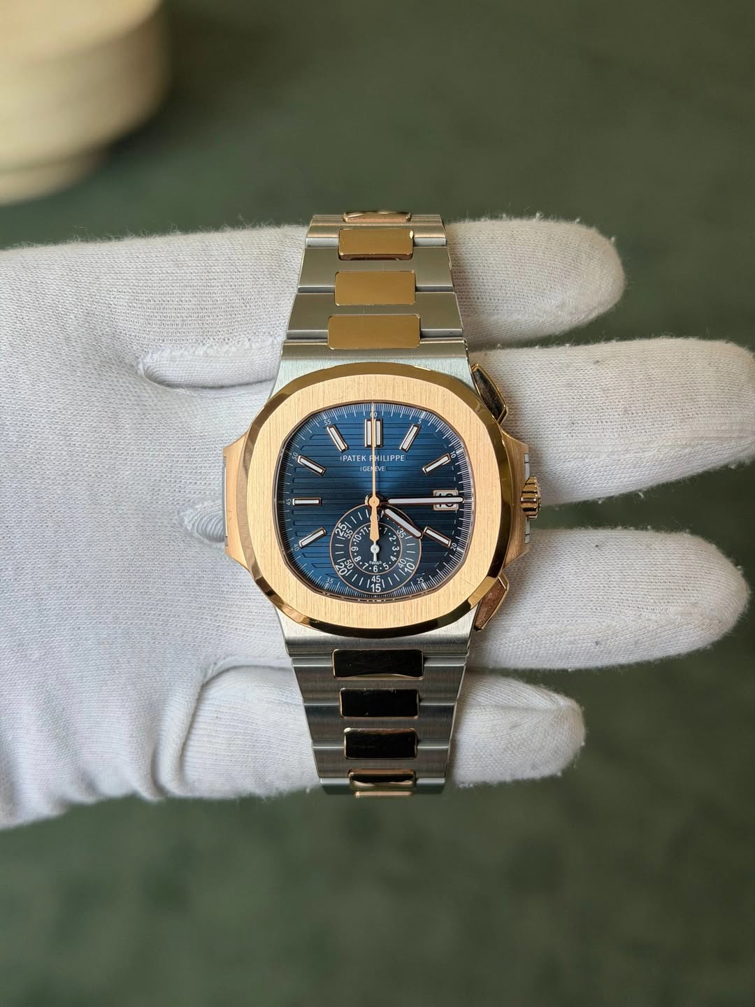 May be an image of wrist watch and text