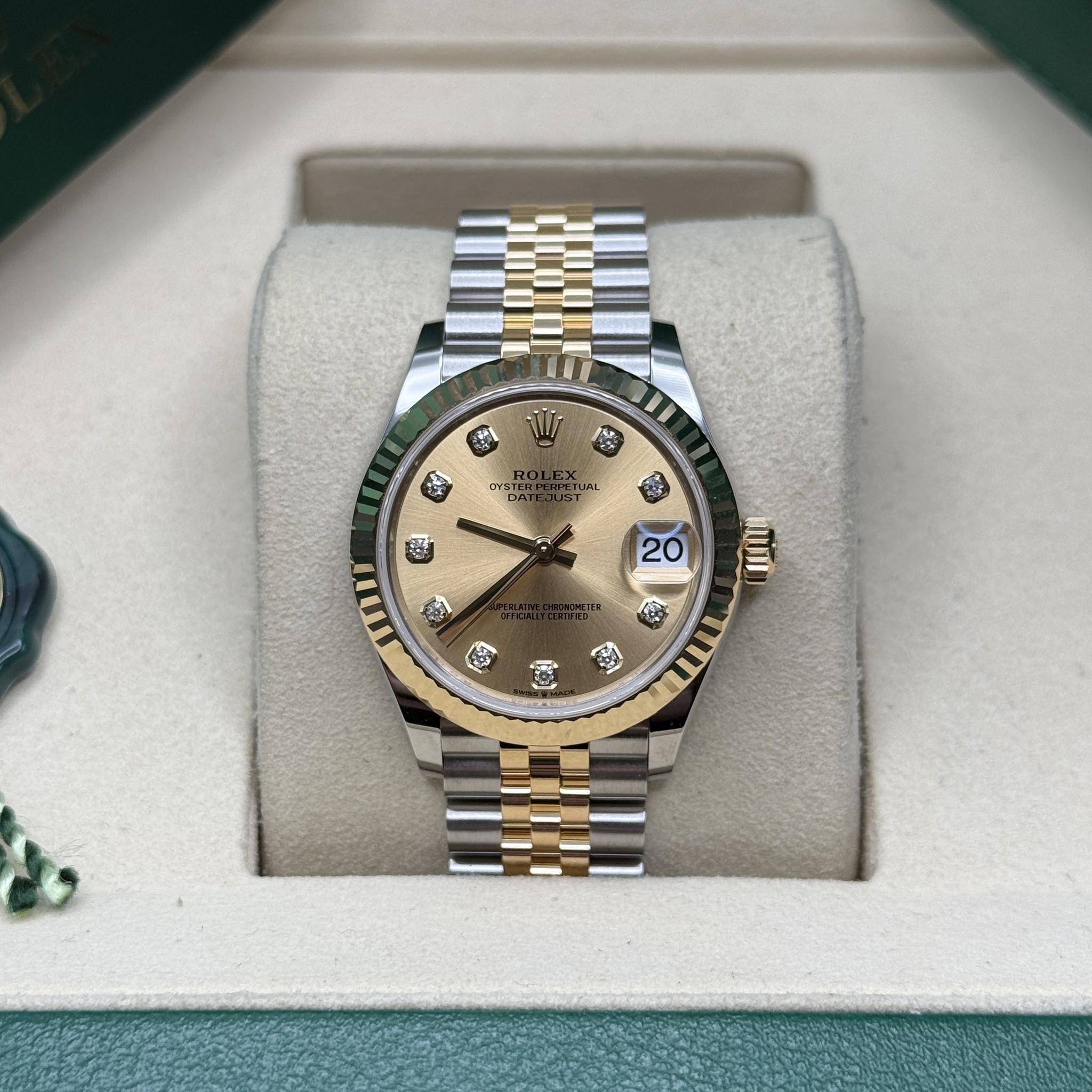 May be an image of wrist watch and text