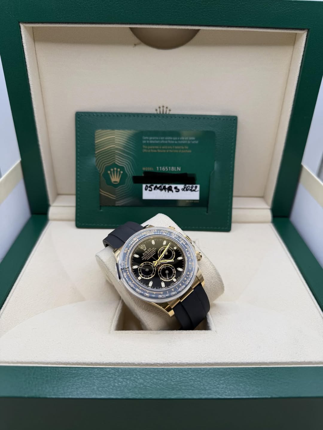 May be an image of wrist watch and text