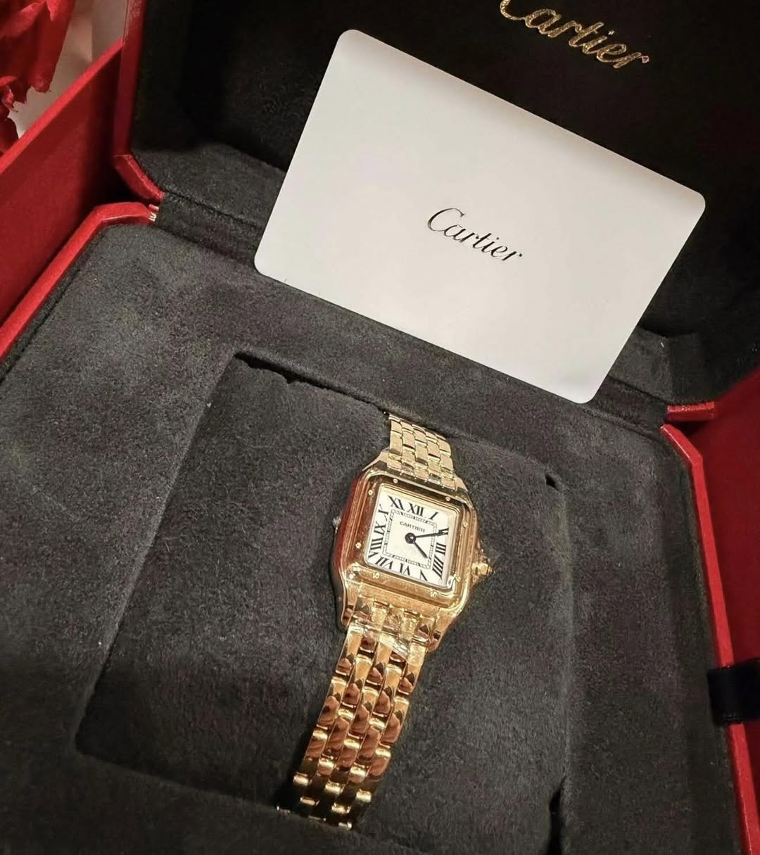 May be an image of wrist watch and text