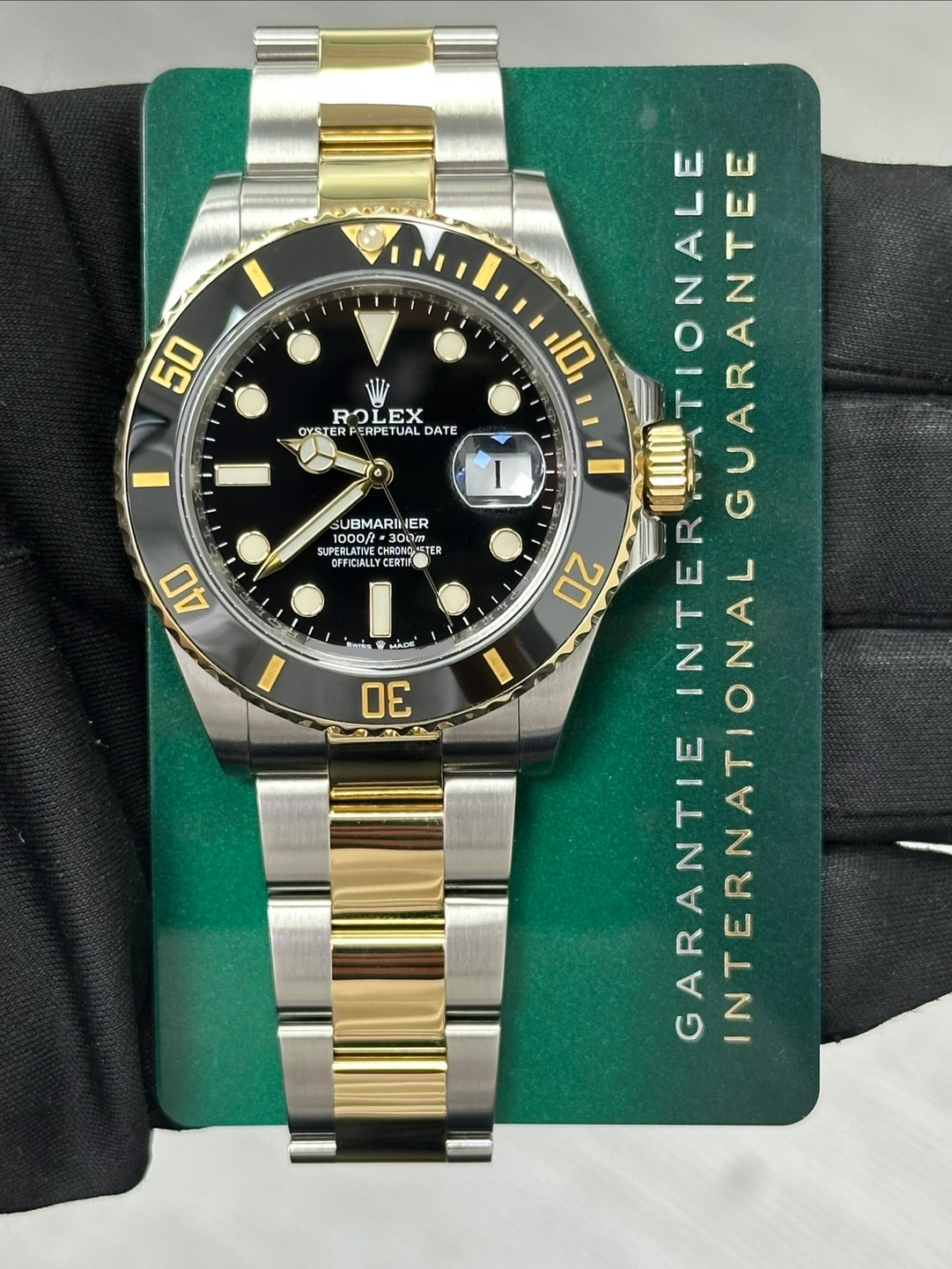 May be an image of wrist watch and text that says '50 ROLEX RO EX OYSTER FERPETUAL DATE SUBMARII IER 1000f= #3OOT cHBoHTAE TER OFFICIALLT FICIALLYCERTA CERT 40 MACE 30 10 ATIONALE…