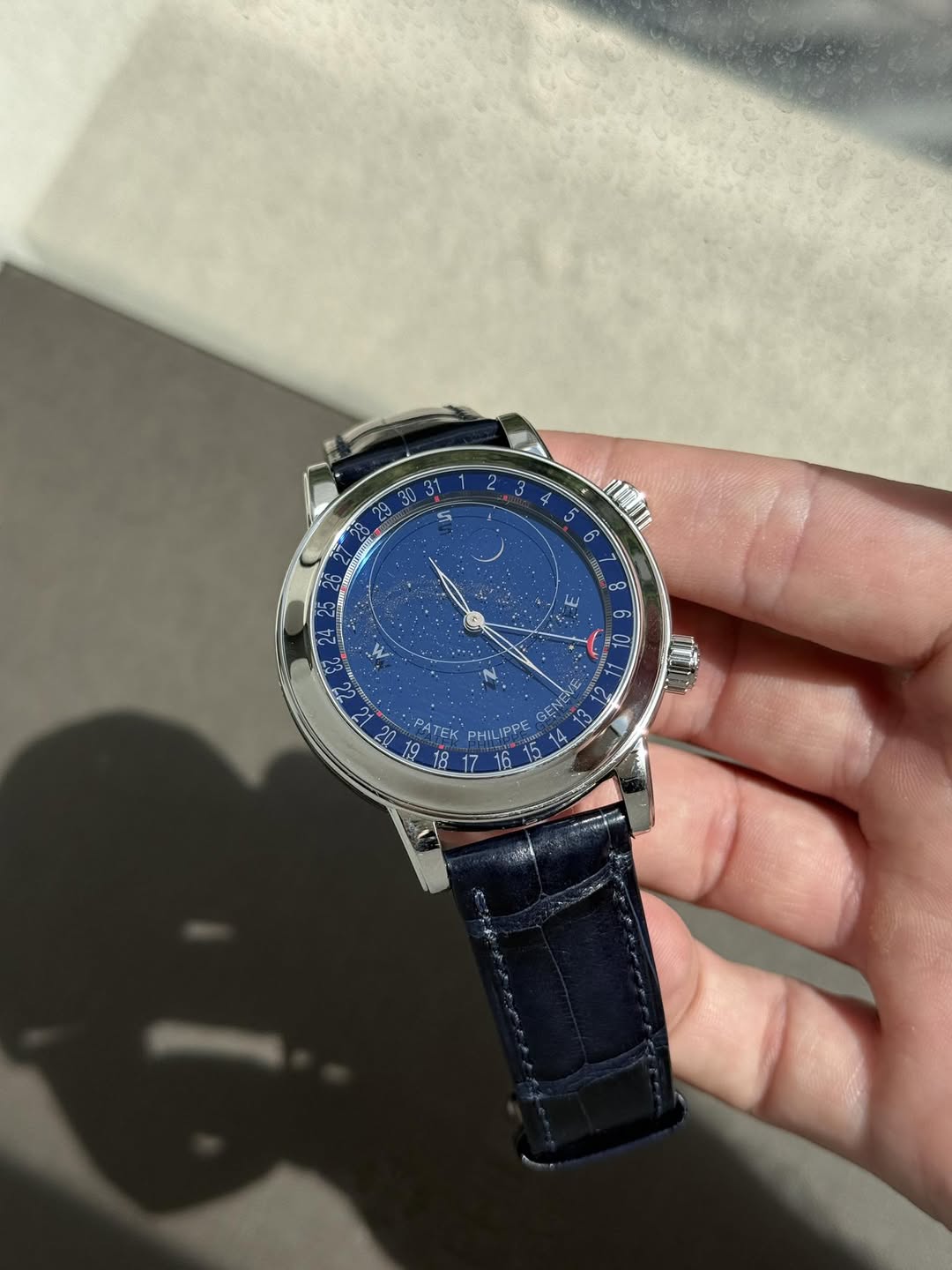 May be an image of digital watch and text