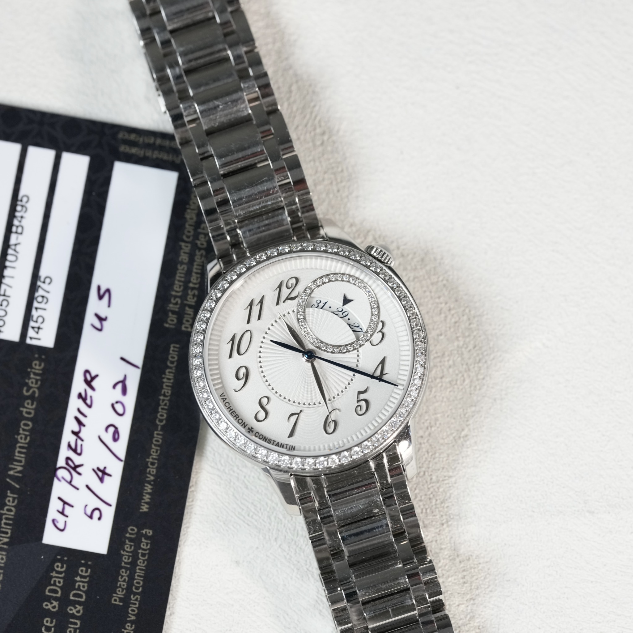 May be an image of wrist watch and text