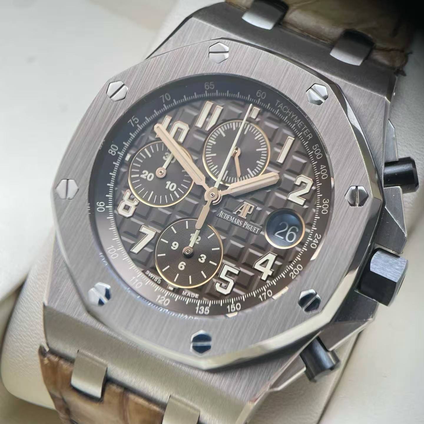 May be an image of wrist watch and text