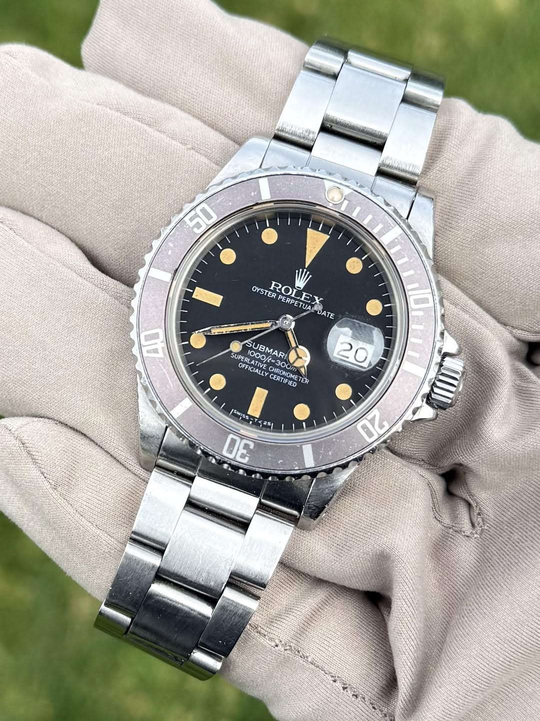 May be an image of wrist watch and text