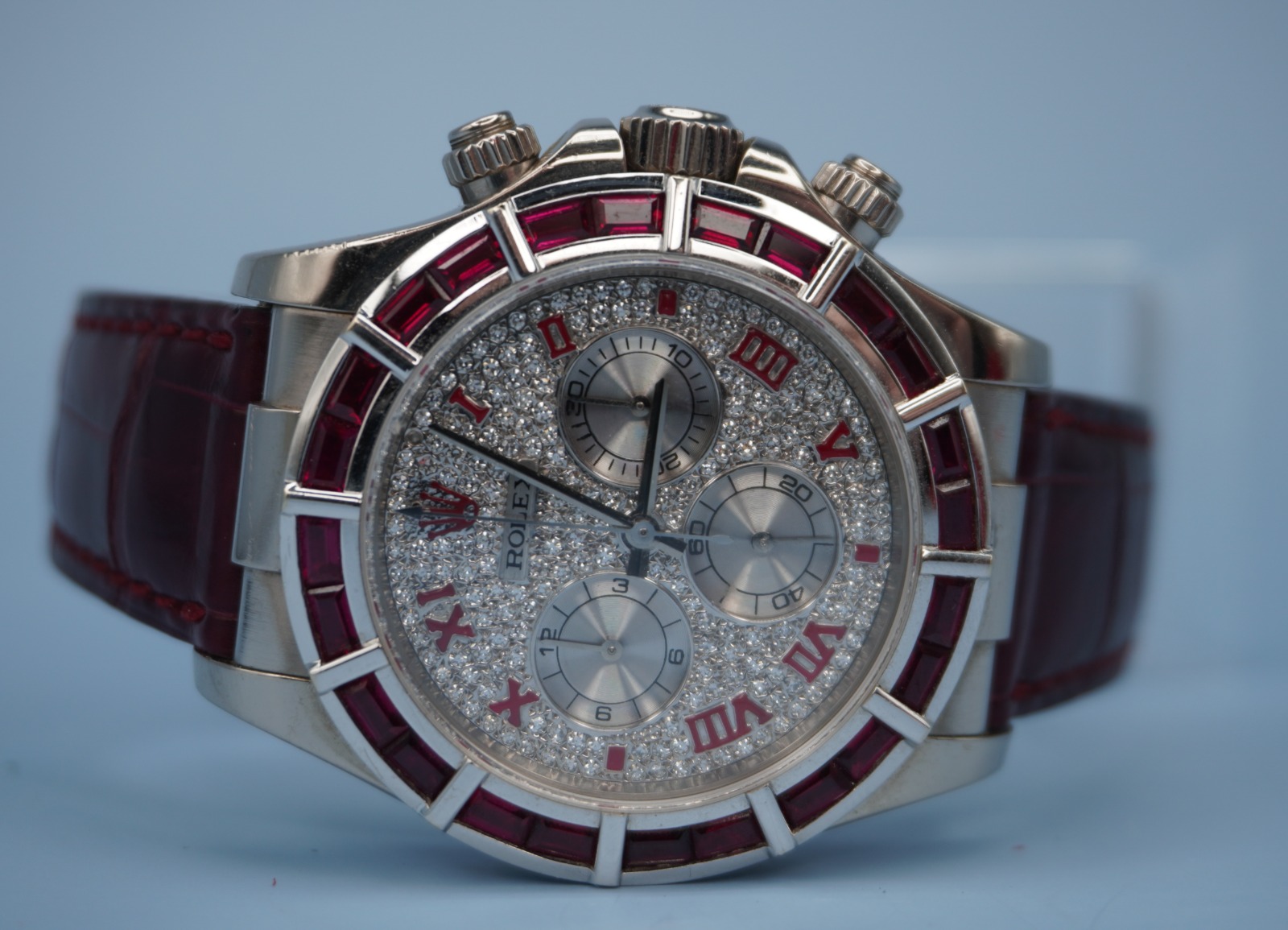 May be an image of wrist watch and text
