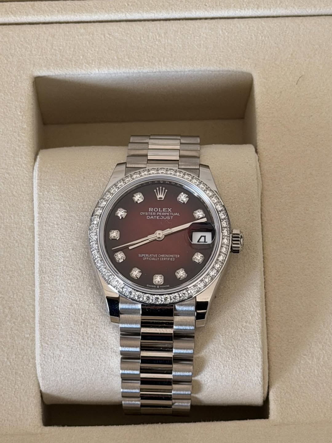 May be an image of wrist watch and text