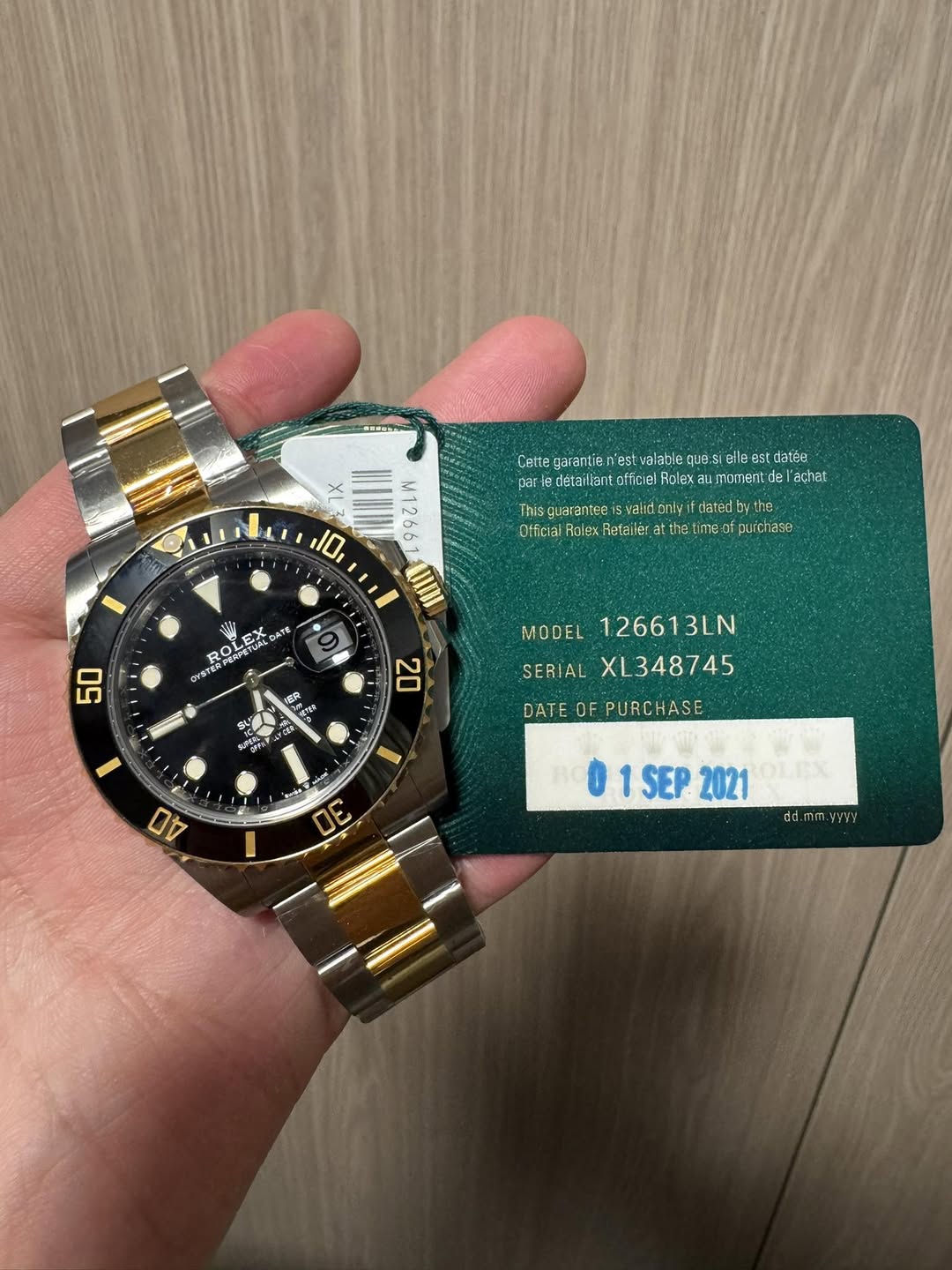 May be an image of wrist watch and text