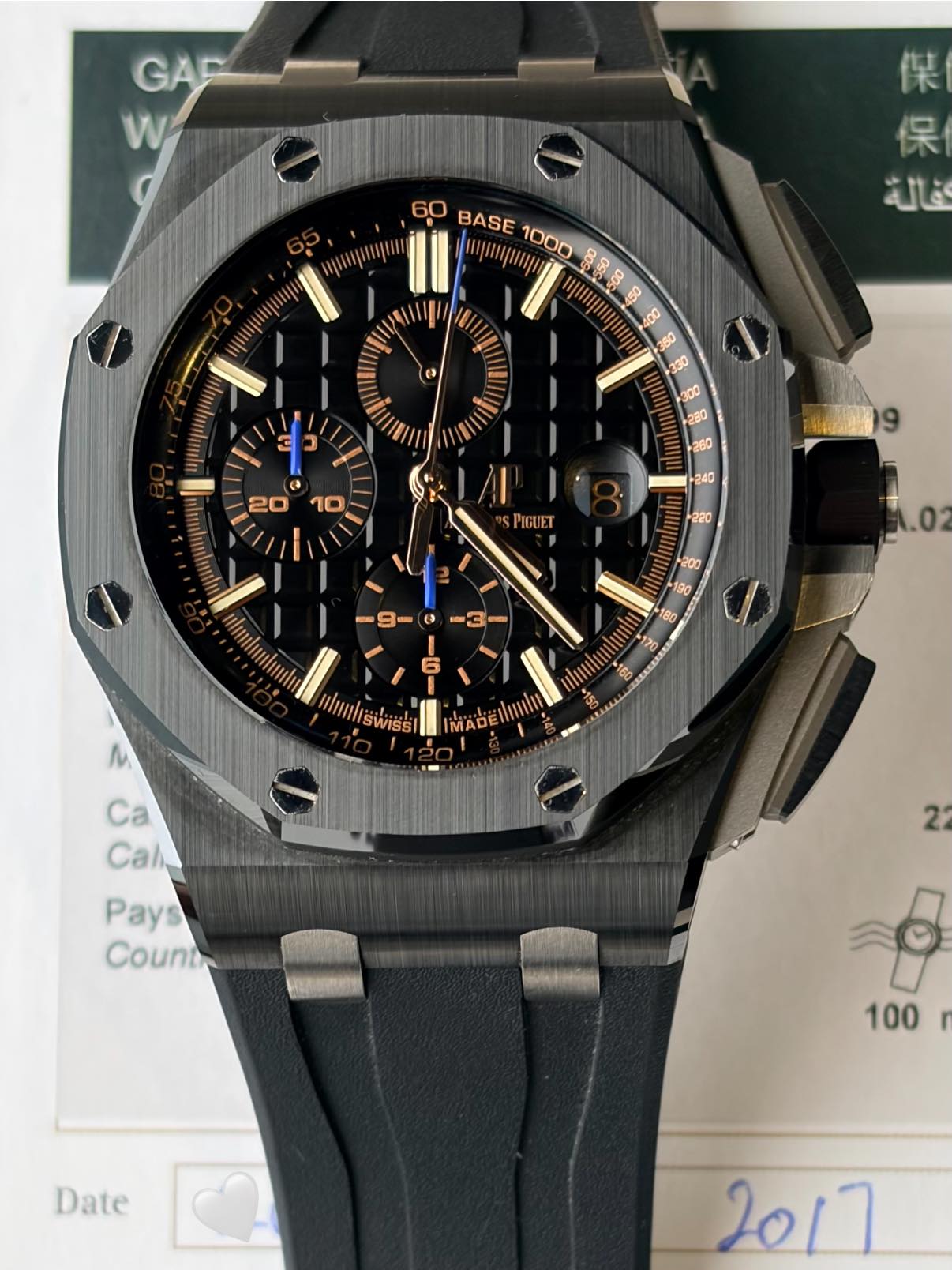 May be an image of wrist watch and text