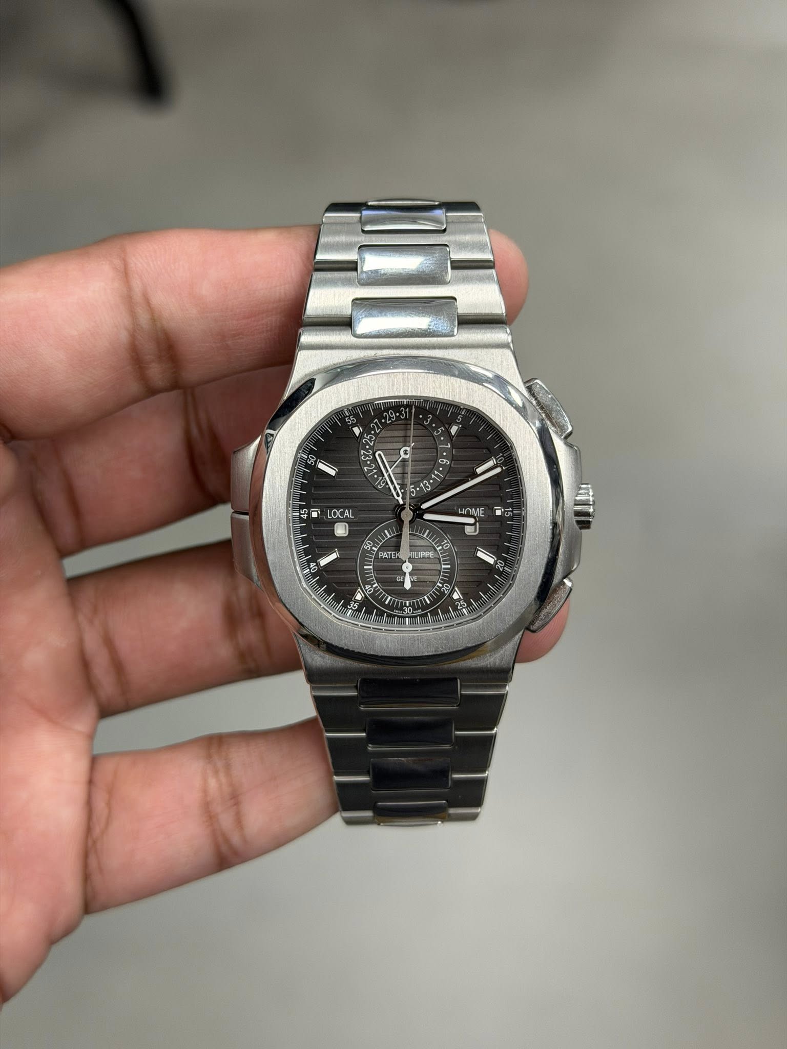 May be an image of wrist watch and text that says '0 - C -13- መዳ 9 LOCAL OME TU LIPPE د A 1 25'