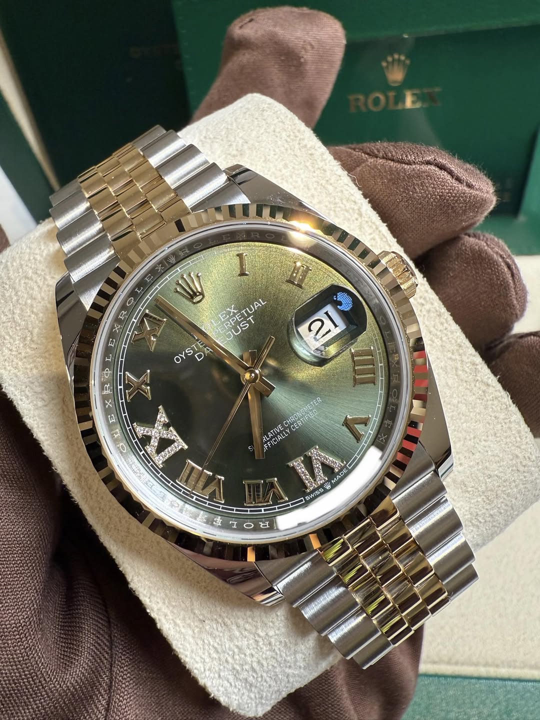 May be an image of wrist watch and text