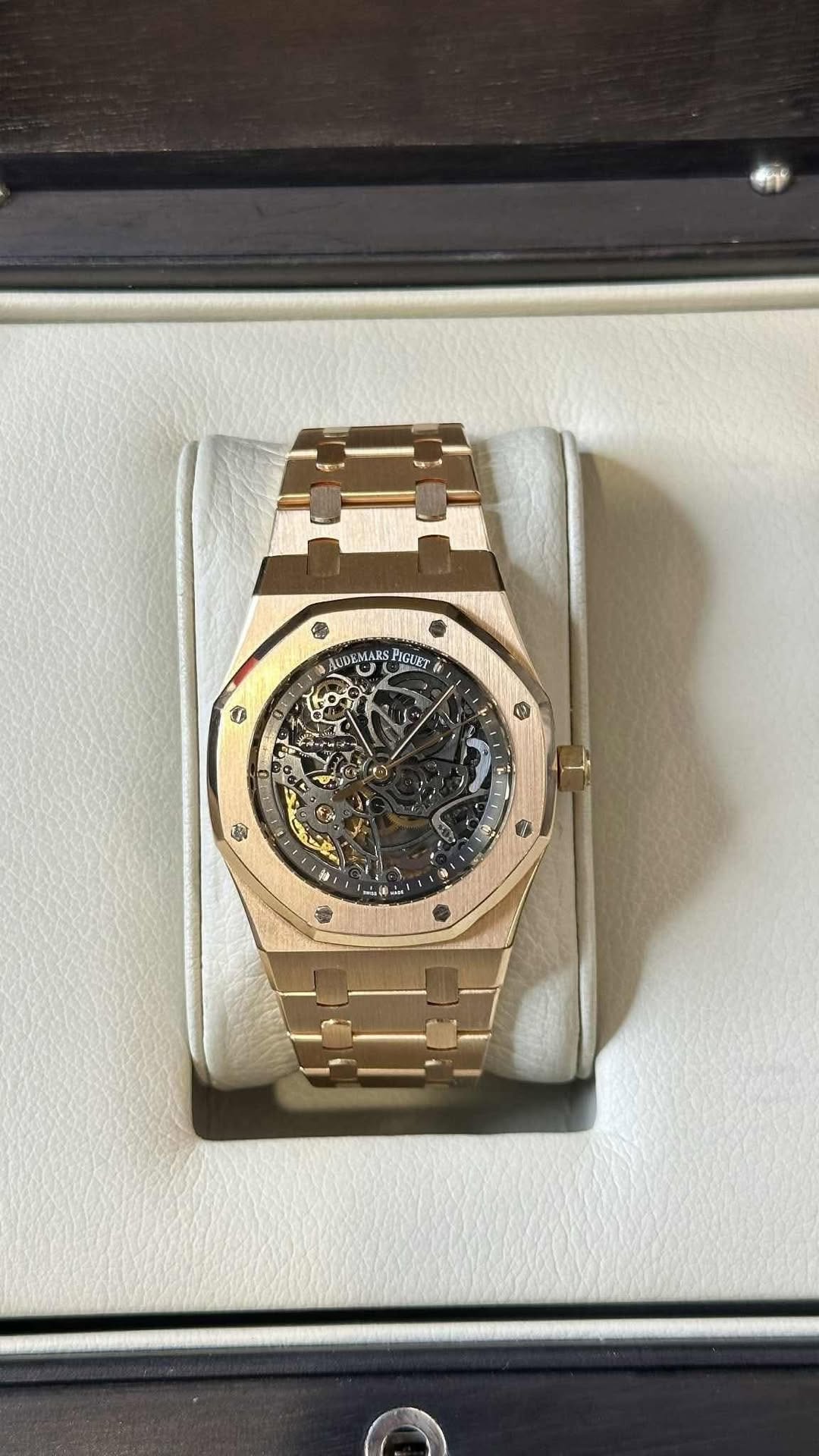 May be an image of wrist watch and text