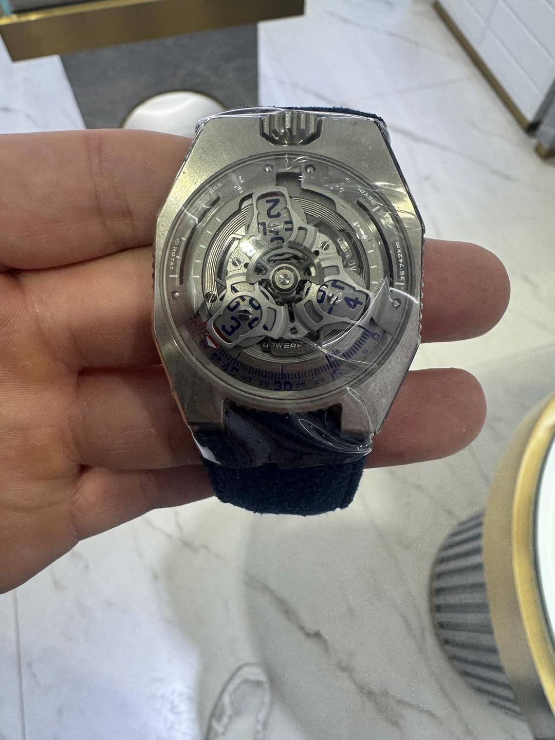 May be an image of wrist watch and text that says 'RUTAT 30'