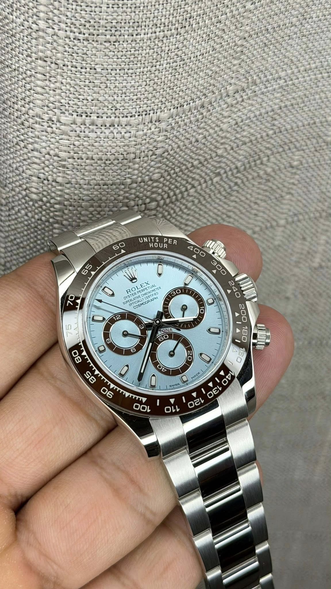 May be an image of wrist watch and text