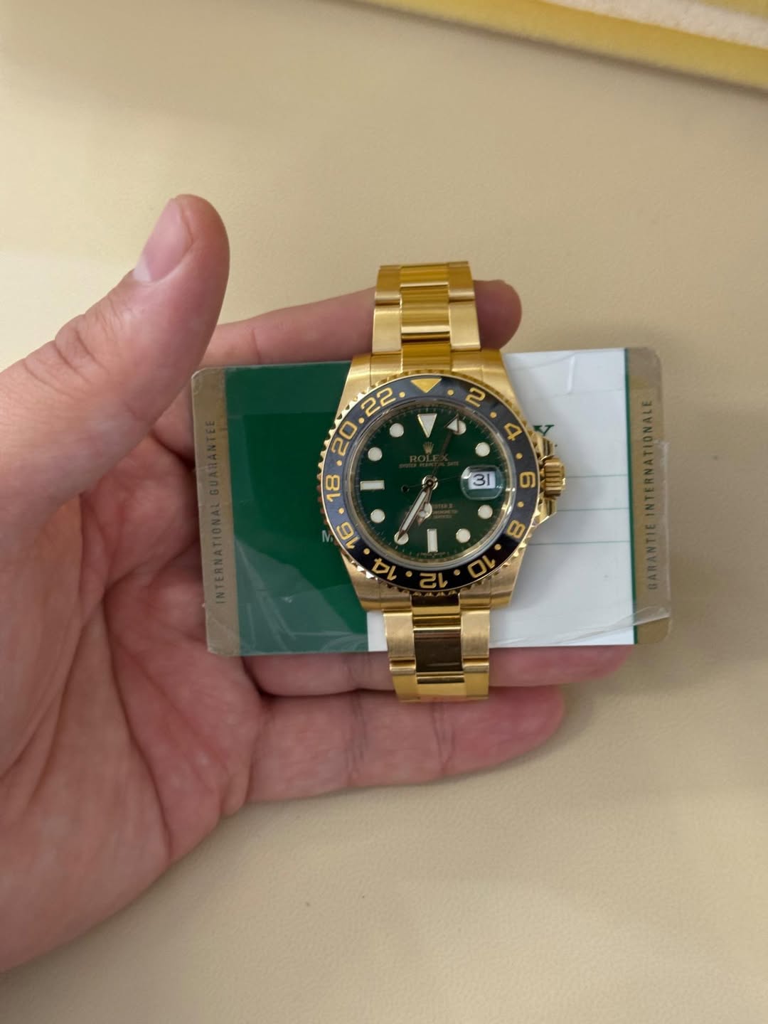 May be an image of wrist watch and text