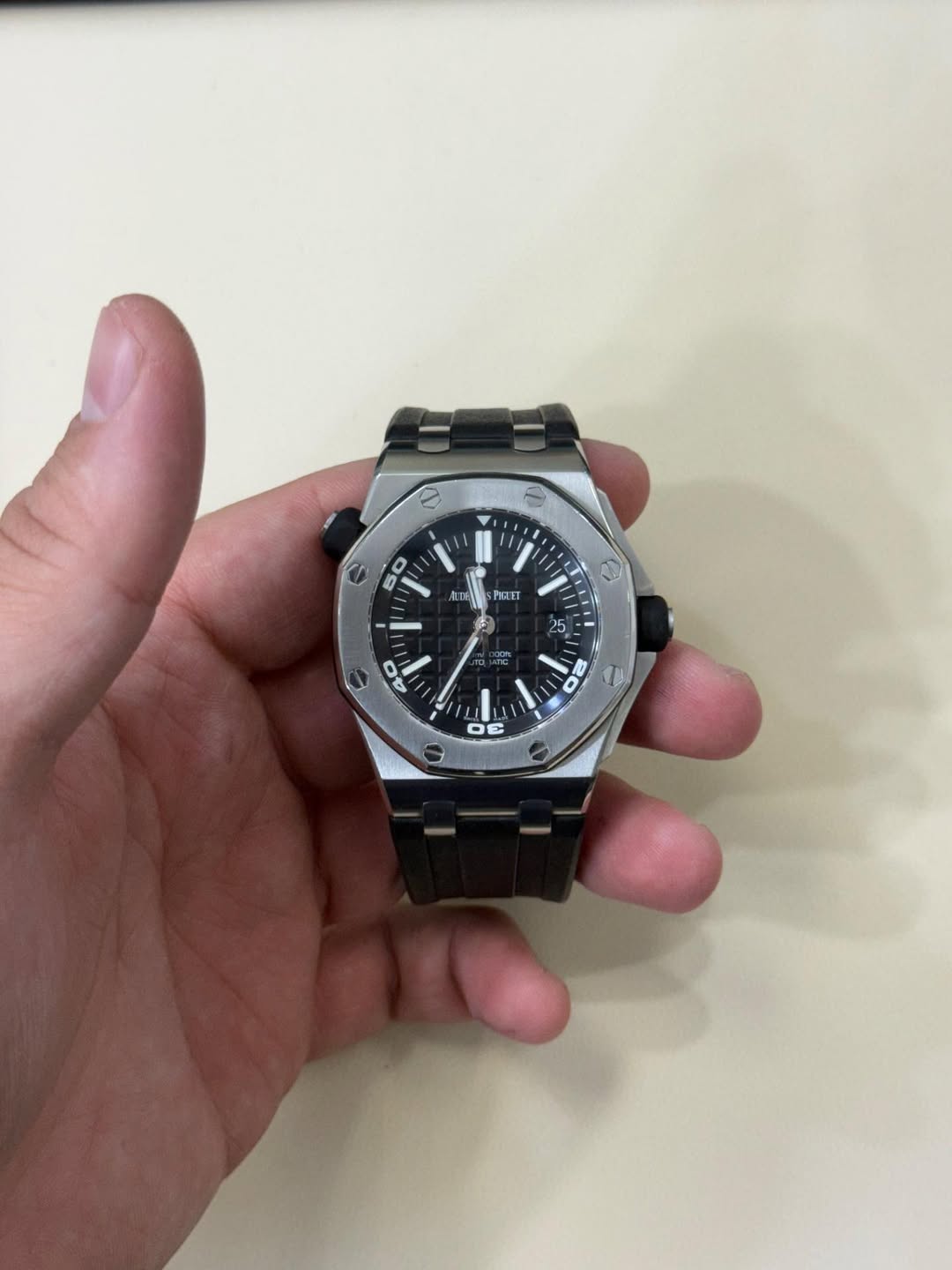 May be an image of wrist watch and text