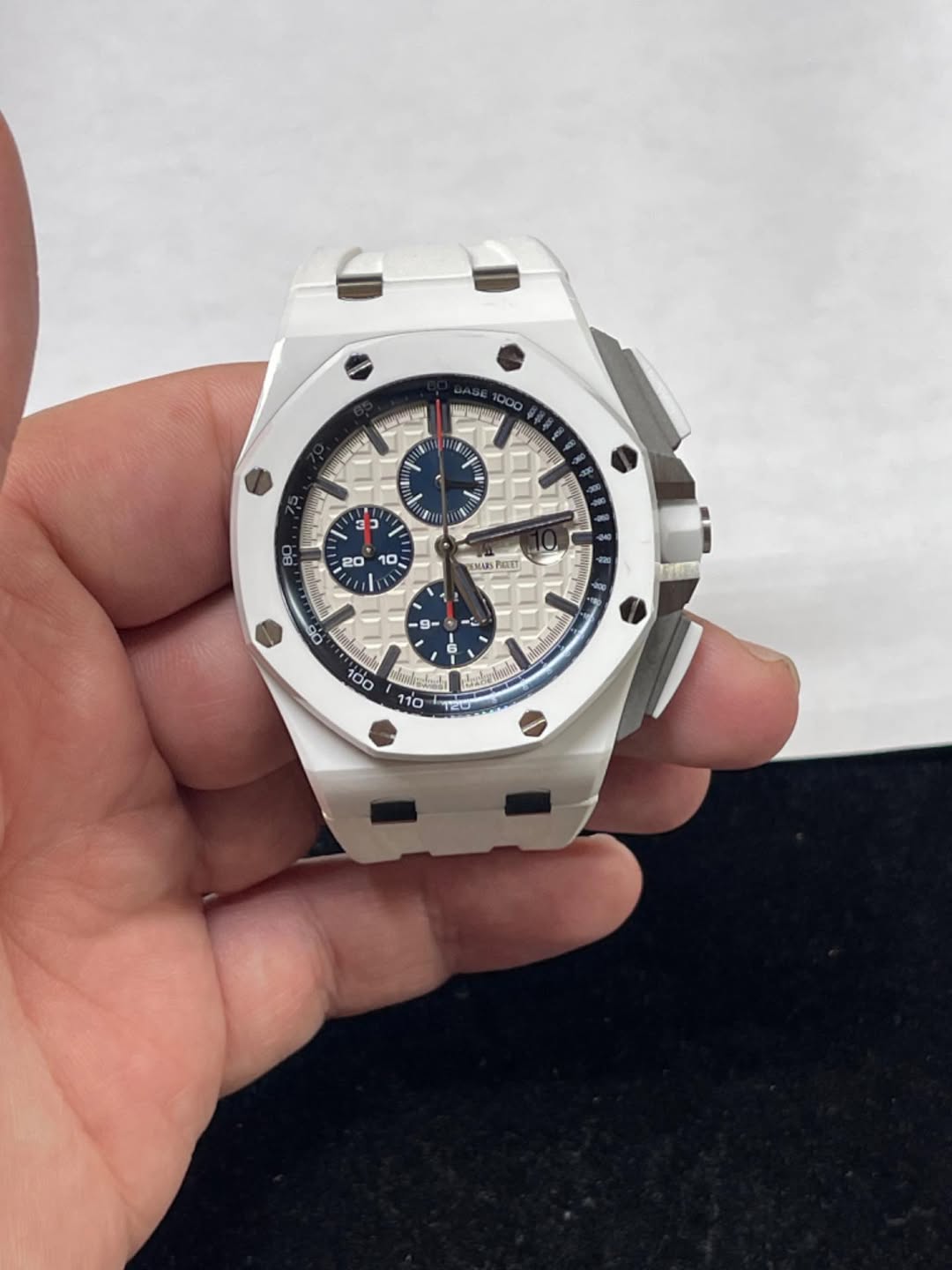 May be an image of wrist watch and text