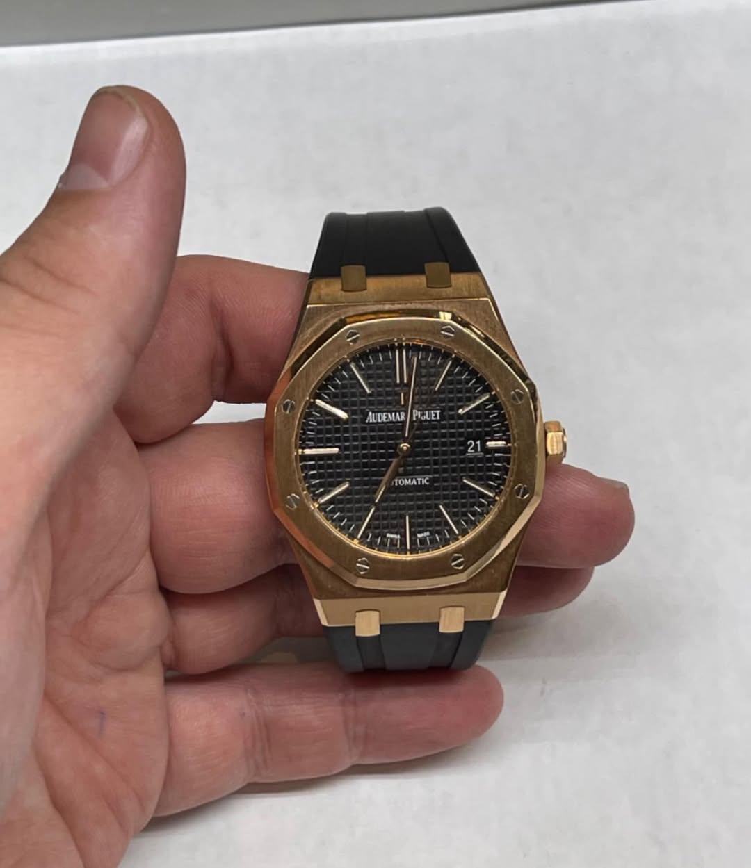 May be an image of wrist watch and text