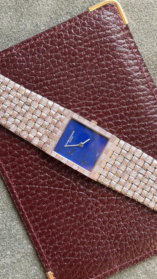 May be an image of saddle-stitched leather, leather wallet and leather