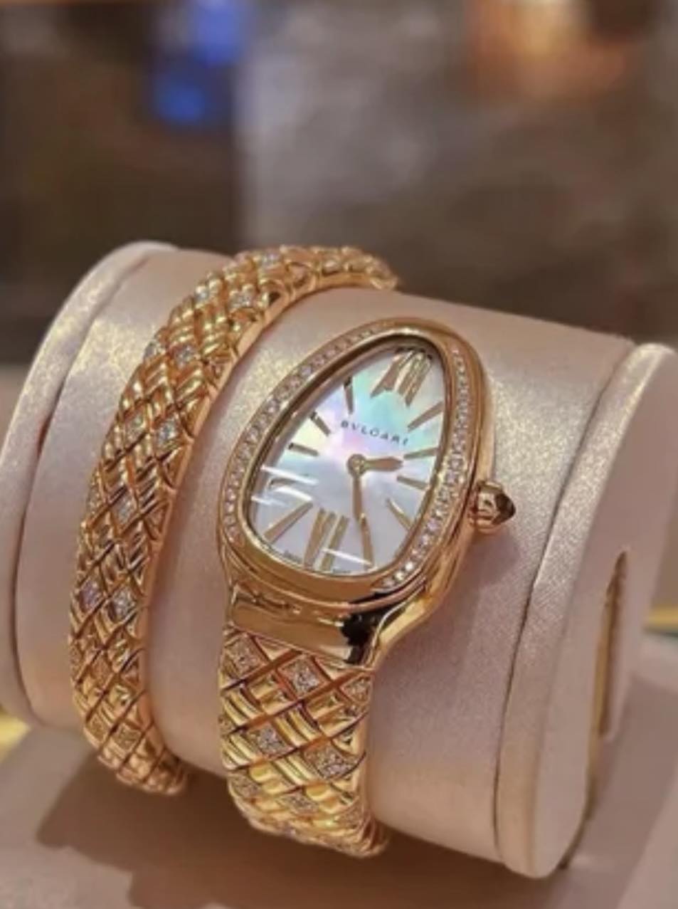 May be an image of wrist watch, jewelry and text