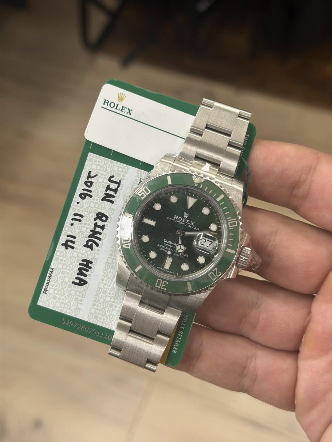 May be an image of wrist watch and text