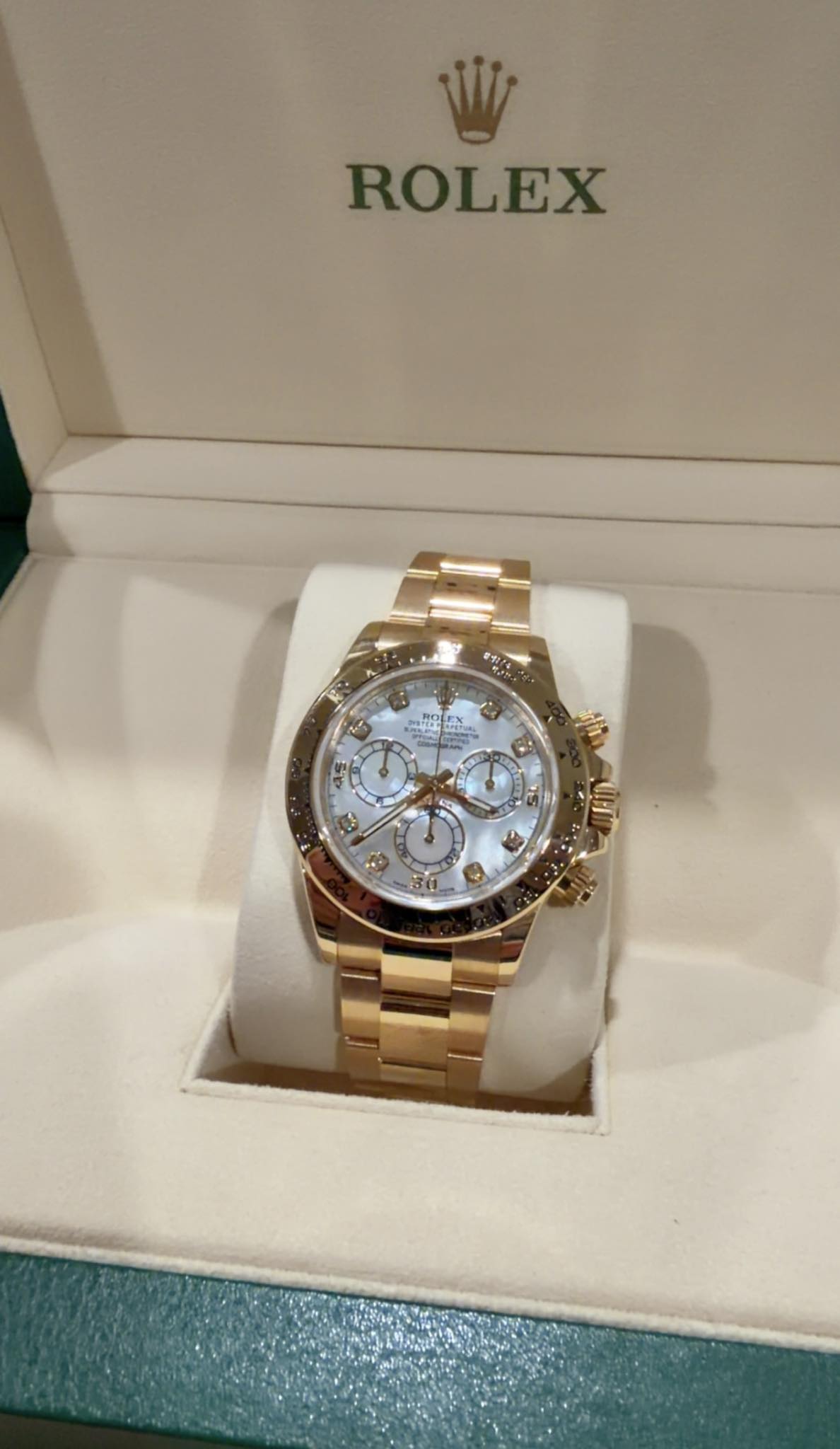 May be an image of wrist watch and text