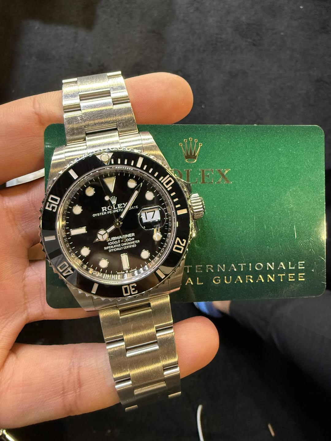 May be an image of wrist watch and text