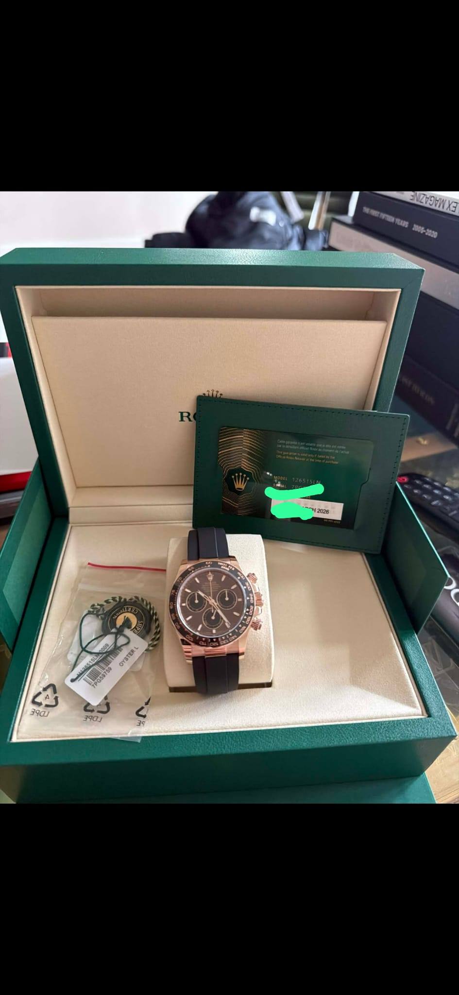May be an image of wrist watch, money and text
