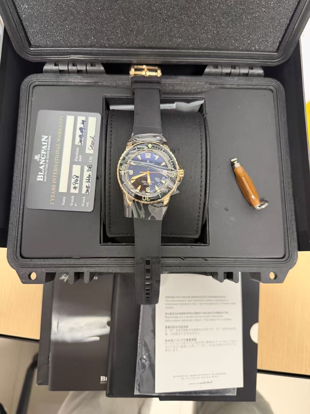 May be an image of wrist watch and text