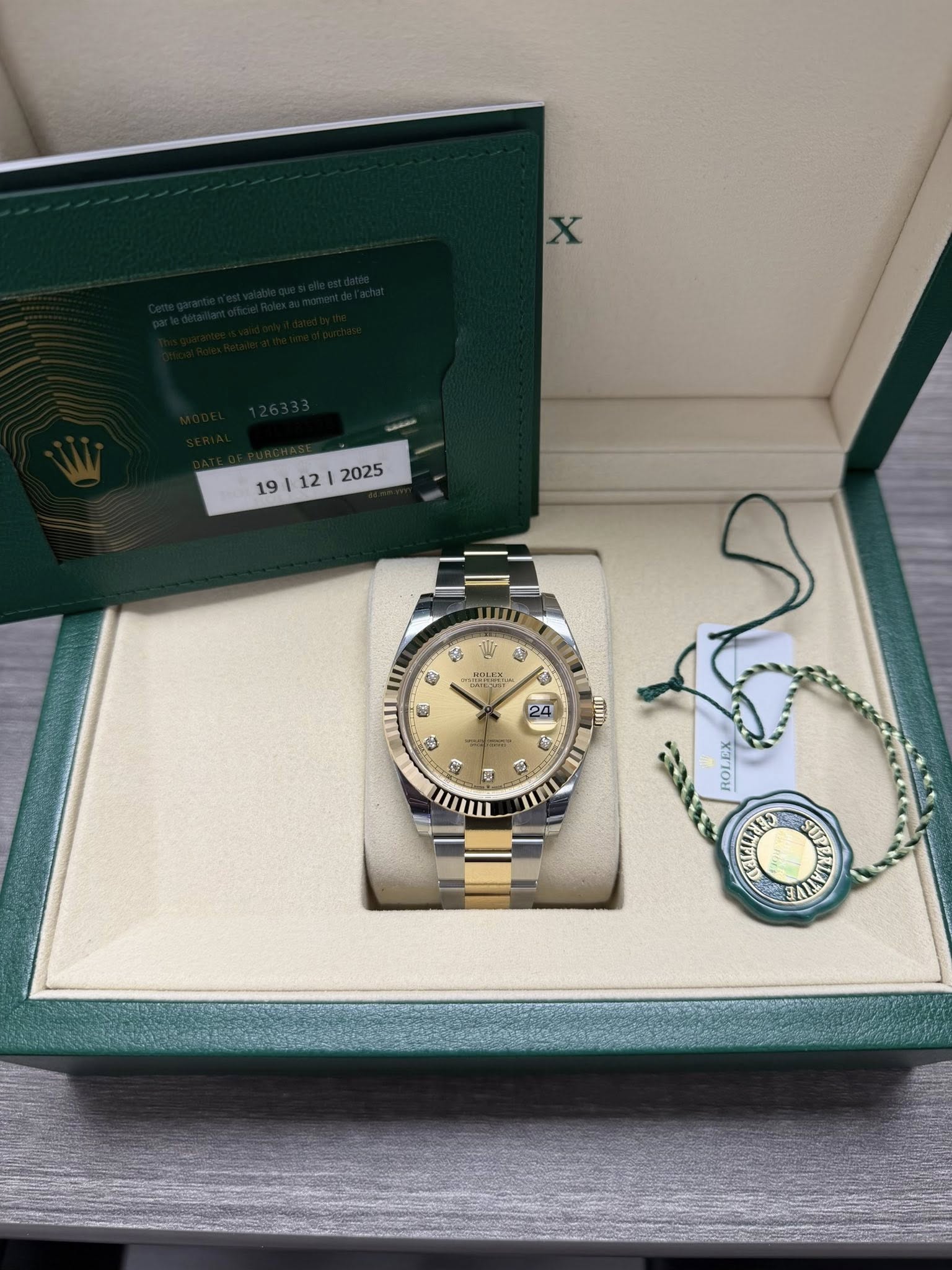 May be an image of wrist watch and text