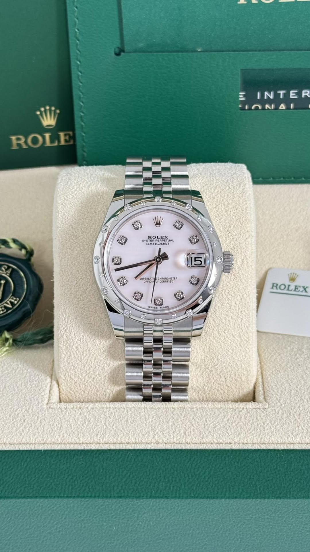 May be an image of wrist watch and text