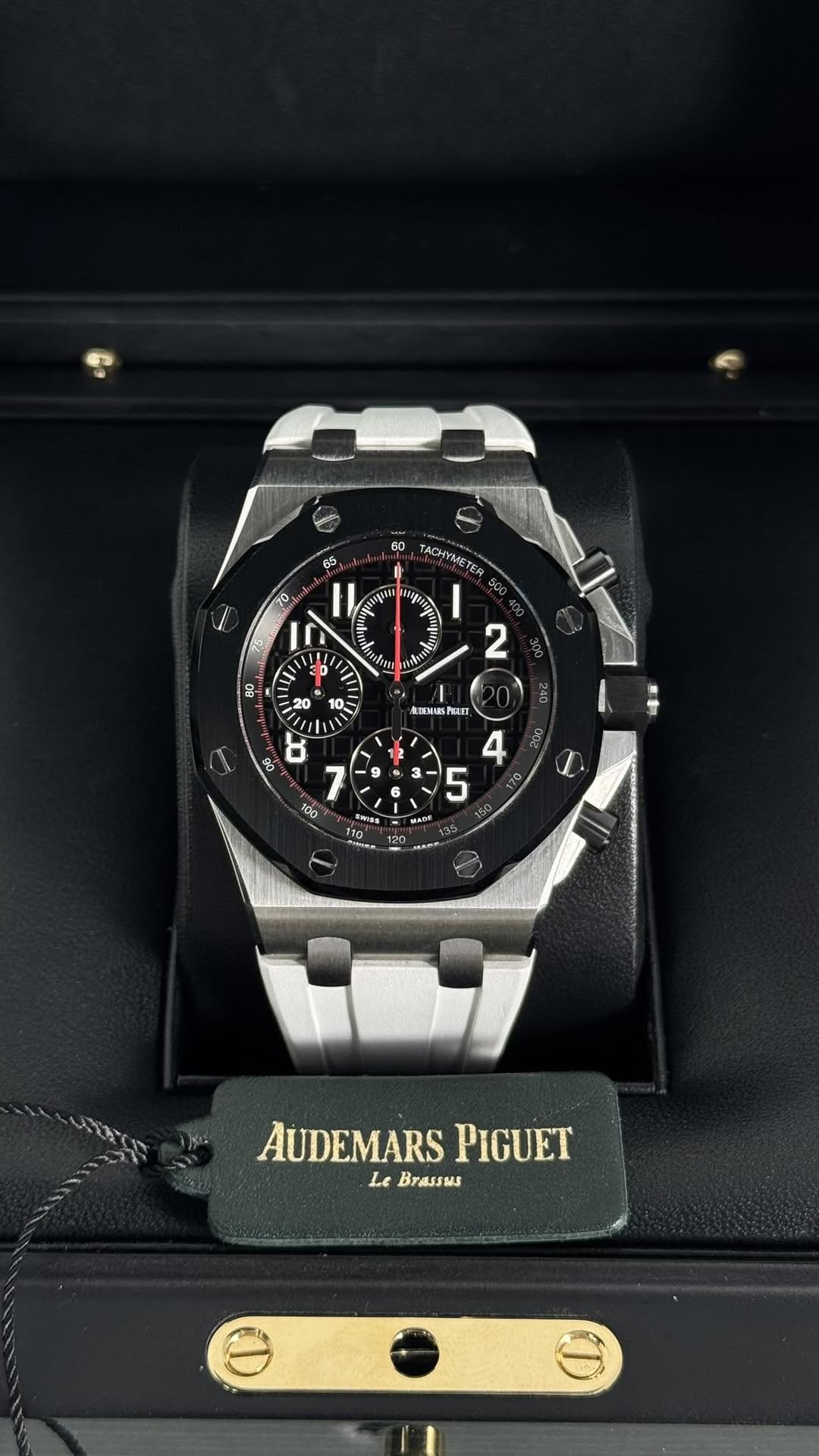May be an image of wrist watch and text
