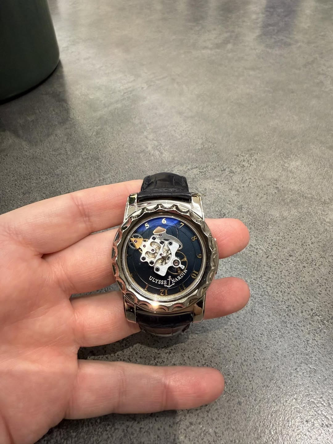 May be an image of digital watch and text