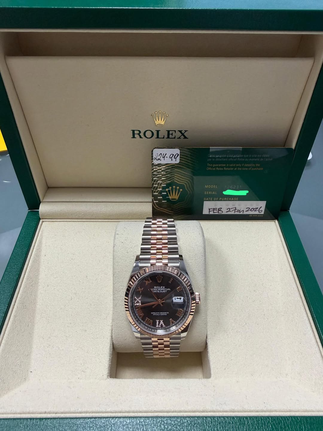 May be an image of wrist watch and text