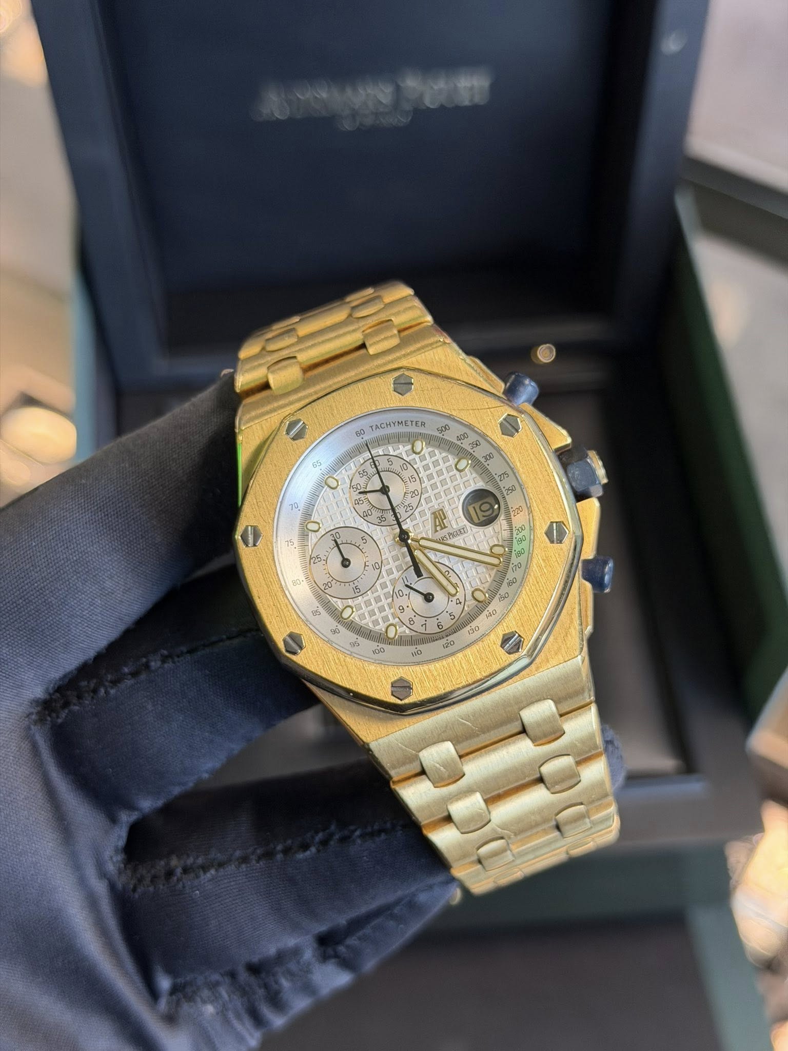May be an image of wrist watch and text
