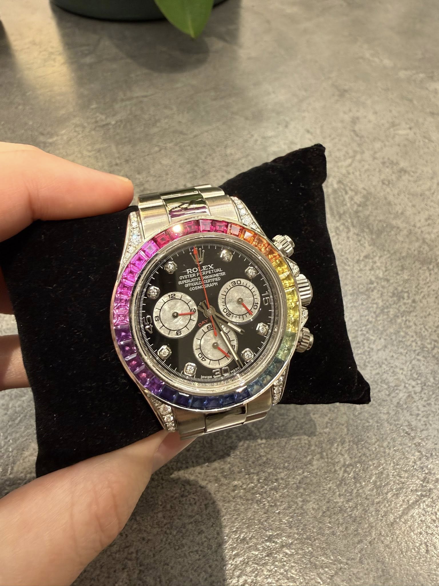 May be an image of wrist watch and text