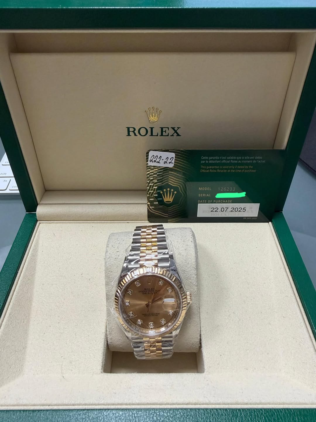 May be an image of wrist watch and text