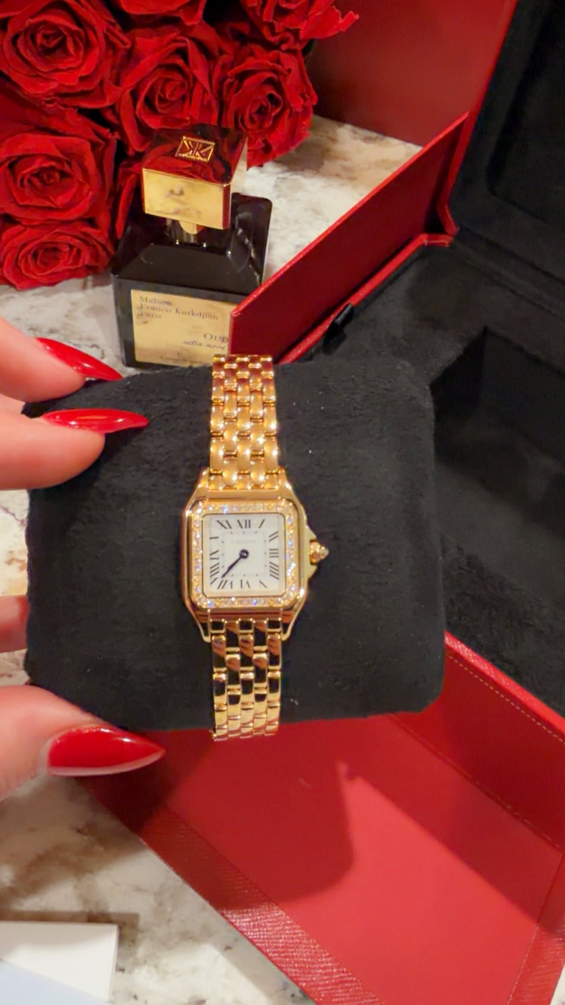 May be an image of wrist watch and text