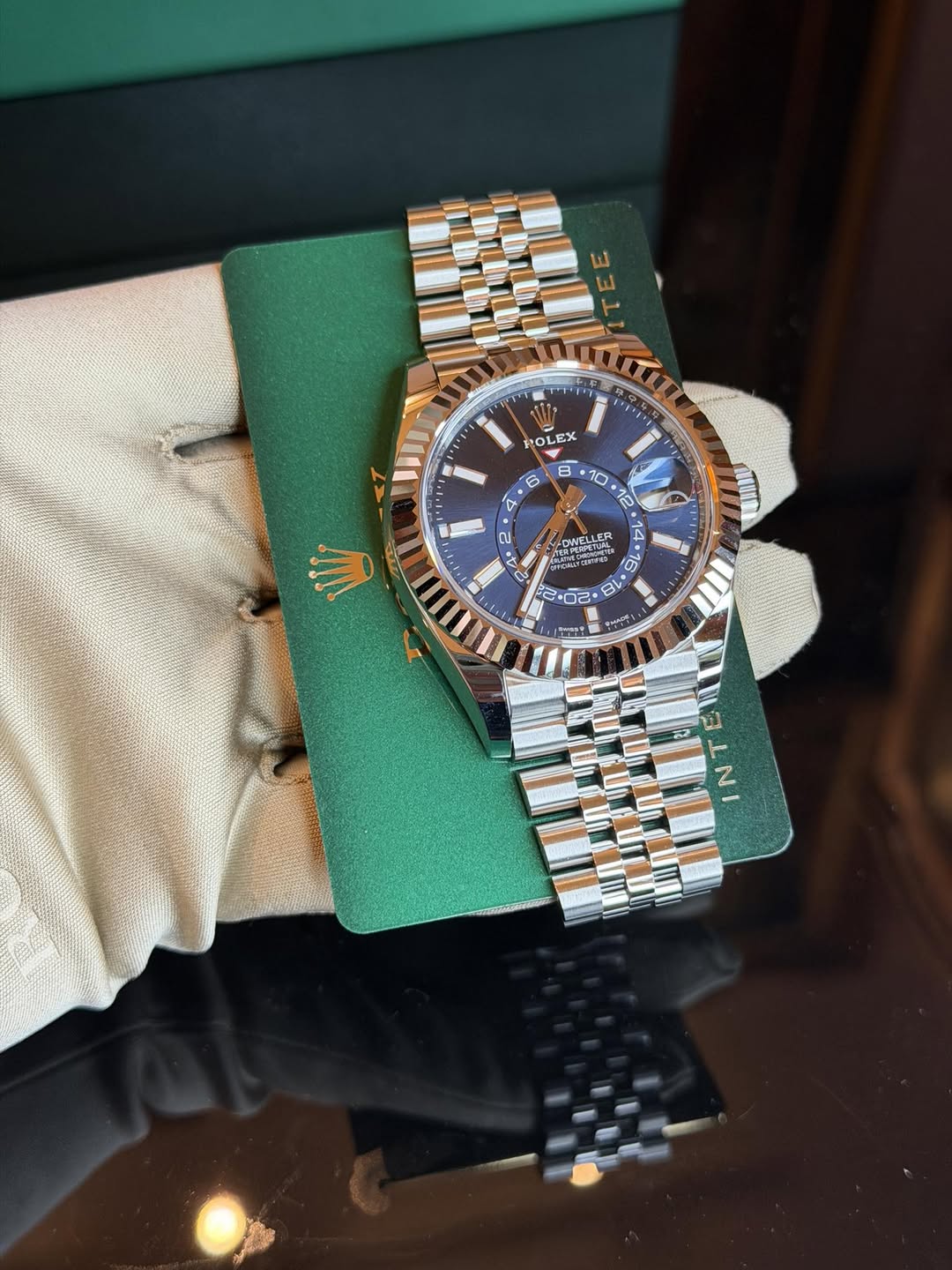 May be an image of wrist watch and text