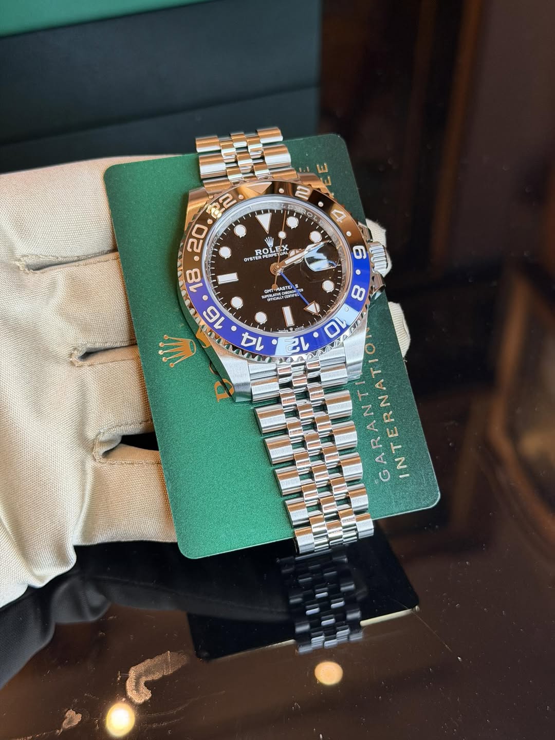 May be an image of wrist watch and text