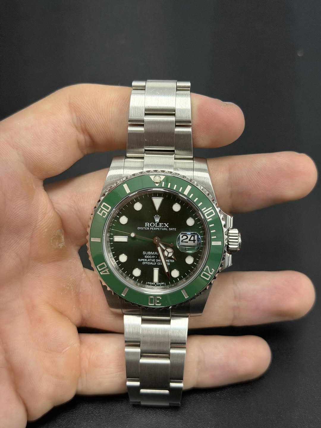 May be an image of wrist watch and text