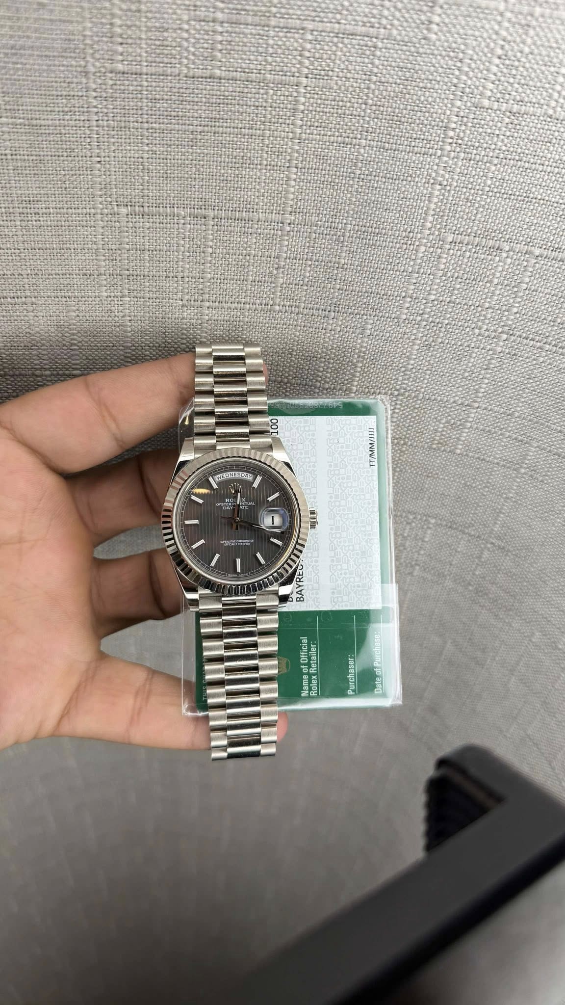 May be an image of wrist watch and text